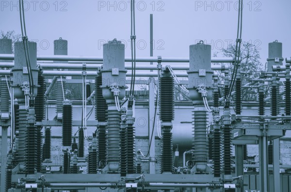Concept of electricity and power generation using the example of insulators and devices in a