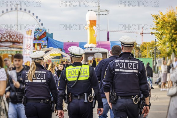 Police patrols at the funfair. The 178th Cannstatter Volksfest on the Wasen attracted 4.2 million