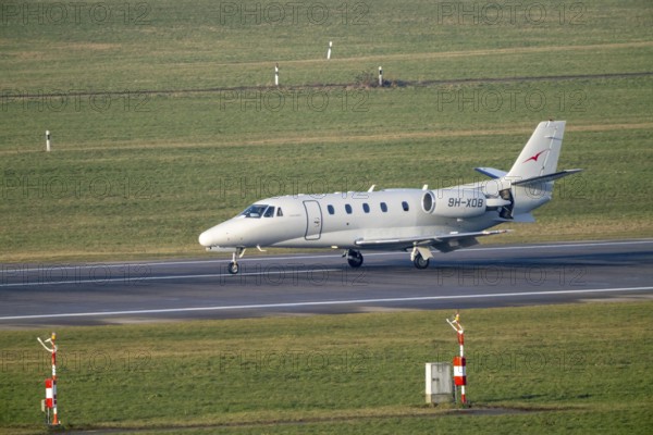 Private jet of the type Cessna Citation XLS, of the private airline Vistajet, on the taxiway,
