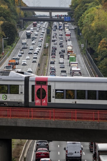 S-Bahn S28 crosses the A3 motorway between the Hilden junction and the Mettmann junction, view to