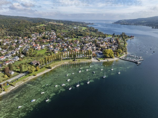 Aerial view of the village of Wangen on the Höri peninsula with boat moorings and jetty on the