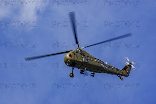 A Sikorsky S-58C transport helicopter in the colours of the German Army with the registration