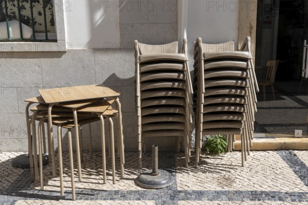 Restaurant furniture, for outdoor catering, tables, chairs, stacked, day off, catering closed, old
