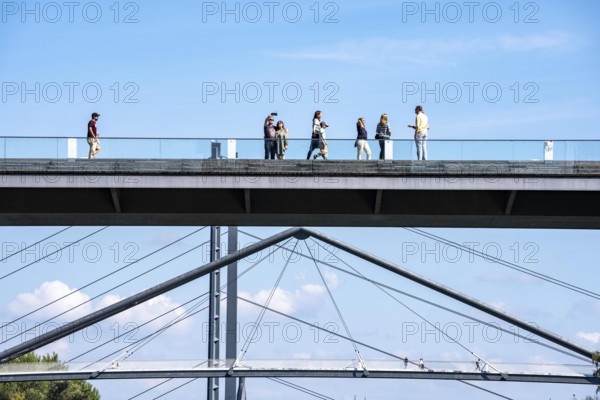 Bridges in Düsseldorf, in the foreground, the pedestrian and cycle bridge over the canal to the