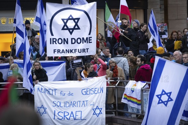 Numerous people gather for a vigil at the Hauptwache in Frankfurt am Main on the second anniversary