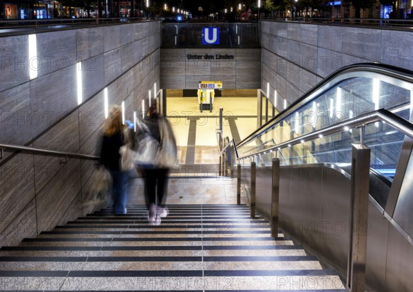 Night photo, long exposure with motion blur, modern underground entrance at Unter den Linden
