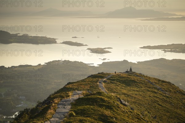 Cairns and view over islands and sea, evening mood, Rørsethornet stone staircase, with 3292 steps