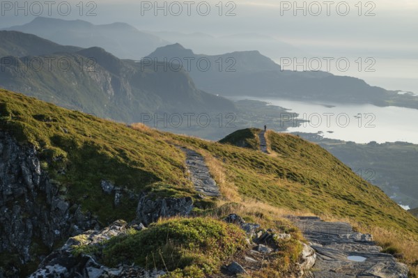 Hikers on Rørsethornet stone staircase, with 3292 steps one of the longest continuous stone