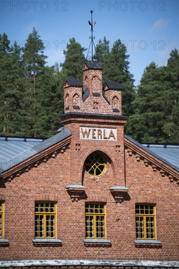 Brick façade with inscription Werla, former paper factory and mill for the production of groundwood