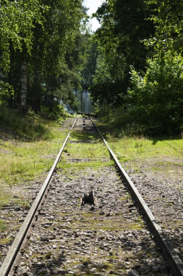 Railway line leads to Lake Väha Kamponen, former paper mill for the production of groundwood pulp