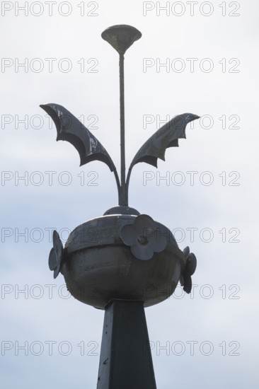 Ornamental iron element on roof peak, former paper mill for the production of groundwood pulp