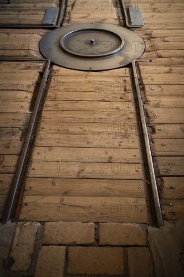 Rails and switch for transporting cardboard, former paper factory and mill for the production of