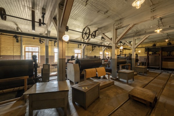 Factory hall with historical machines for the production of cardboard and paper, former paper