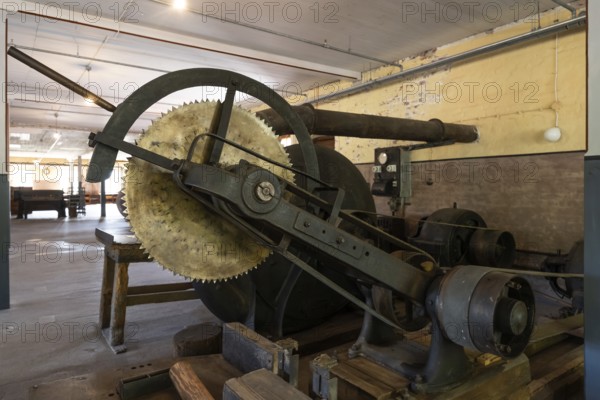 Large historic circular saw, former paper mill and mill for the production of groundwood pulp
