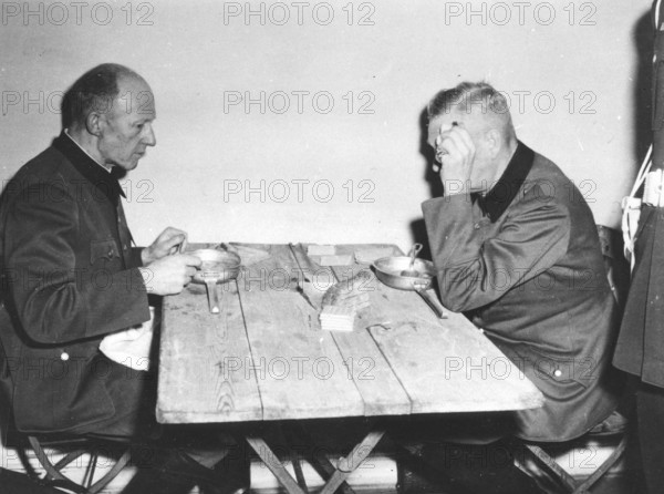 Nuremberg Trials, main war criminals, Keitel on the right, Kaltenbrunner on the left at dinner.