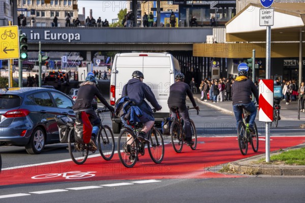 Cycle path, cycle lane, marked in red to draw the attention of motorists to the cycle path, between