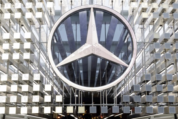 Munich, Germany - 10.9.2025: A large Mercedes star, logo of the German car manufacturer