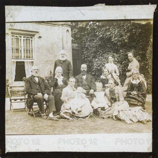 Portrait group photograph three generations prosperous middle-class Victorian Edwardian family,
