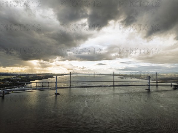 Rain clouds over Forth Road Bridge and The Queensferry Crossing from a drone, Queensferry Crossing,