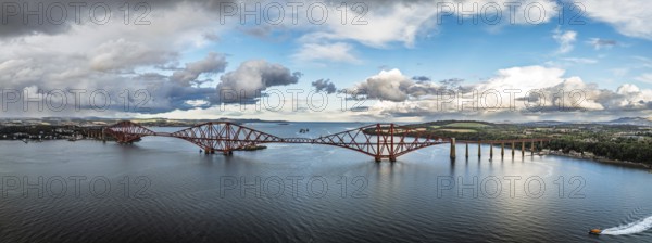 Panorama of Rain clouds over Forth Bridge from a drone, Queensferry Crossing, Forth Estuary,