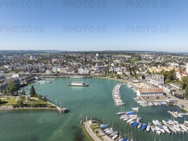 Harbour area, ferry port, marina, marina of Romanshorn with Seepark and the incoming ferry MF