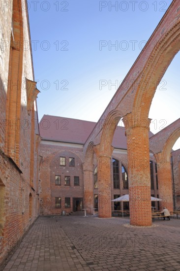 Interior view of the St Bartholomäi church ruins, view upwards, open, archways, columns, pillars,
