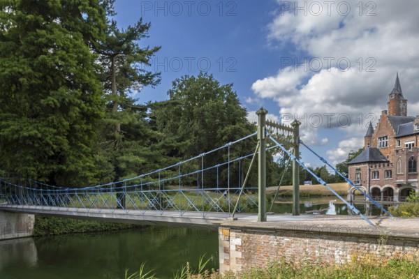 1824 iron suspension bridge in park of the Wissekerke Castle, Kasteel van Wissenkerke in the