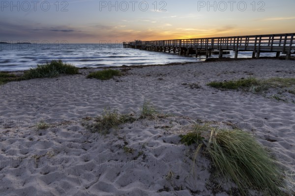 Spacious, empty beach with a pier, evening lighting, gentle sound of the sea, pier, Kobaek Strand,