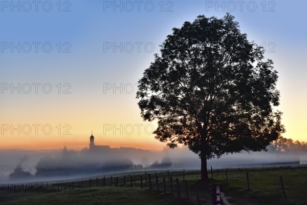 Sunrise at the pilgrimage church of the Visitation of the Virgin Mary in Ilgen im Allgäu, Bavaria,