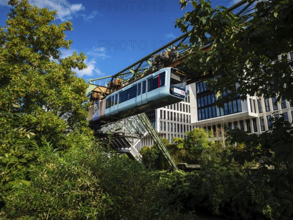 The Wuppertal suspension railway at Ohligsmühle station in Elberfeld, Wuppertal, Germany, digitally