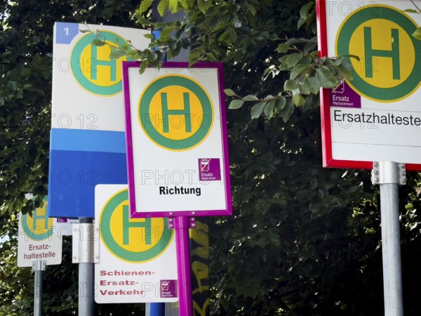 Many signs for rail replacement services due to construction work on Deutsche Bahn railway lines in