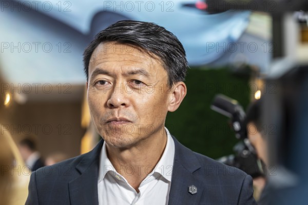 Tianshu Xin, CEO Leapmotor International. Exhibition stand of the Chinese manufacturer Leapmotor.