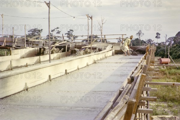 Open Cast gravel-pumping tin mine Malaya, Malaysia, south east Asia 1964 - Ore separation in the