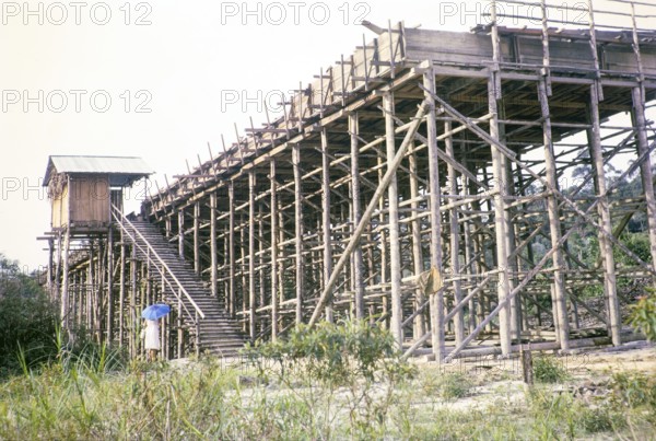 Open Cast gravel-pumping tin mine Malaya, Malaysia, south east Asia 1964 - pumping raises the