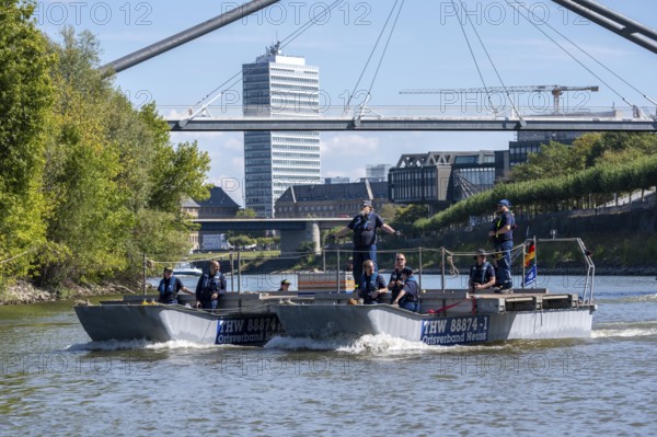 Exercise run of a multi-purpose pontoon on the Rhine, Medienhafen, the skipper gives instructions