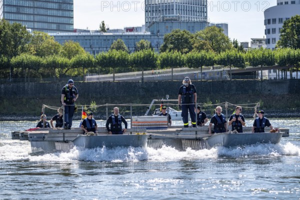 Exercise run of a multi-purpose pontoon on the Rhine, Medienhafen, of the Water Hazards Section, in