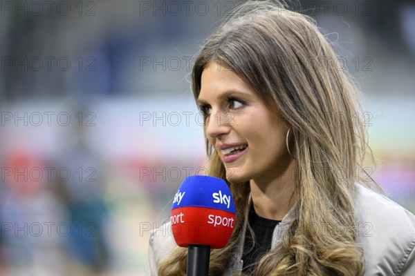 SKY presenter Mara Mones in interview Microphone Microphone Logo Portrait smiles Voith-Arena,