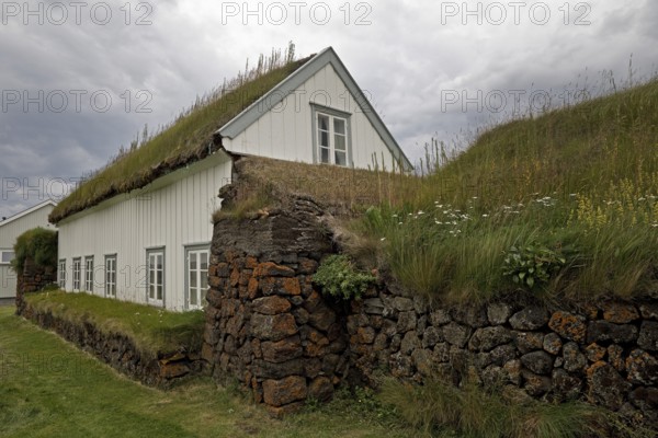 Grass sod house settlement Grenjadarstadur with church, Thingeyjarsveit municipality, North