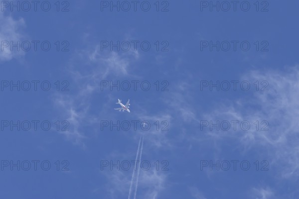 Two airliners Airbus A380 jet passenger aircraft of Emirates airlines and a Boeing 737 of Norweign
