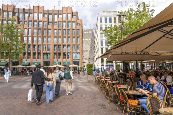 The Grote Markt in the old town of Groningen, modern facades of hotel and commercial buildings, in