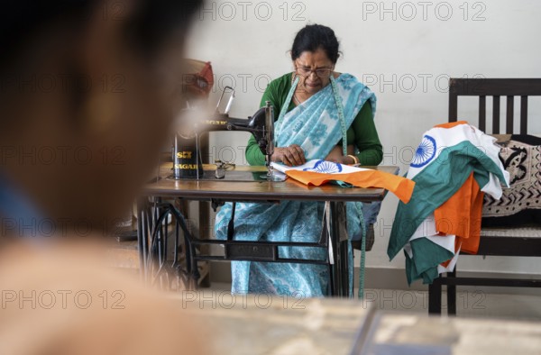 Employees of the Assam Khadi and Village Industries Board stitching in a manufacturing unit of