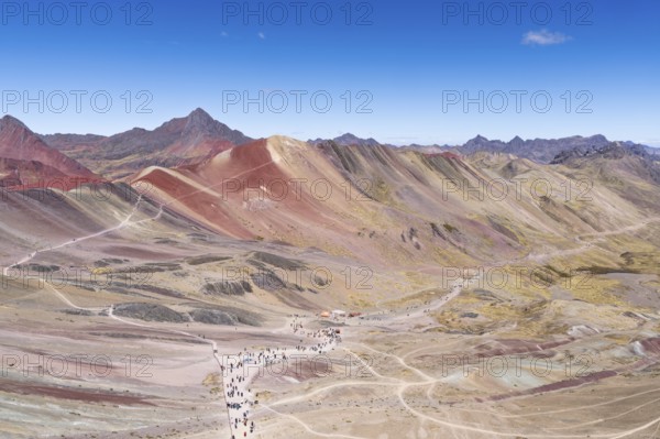 Vinicunca, colourful mountains in the background, in the Peruvian Andes, Cusipata district, Cusco,