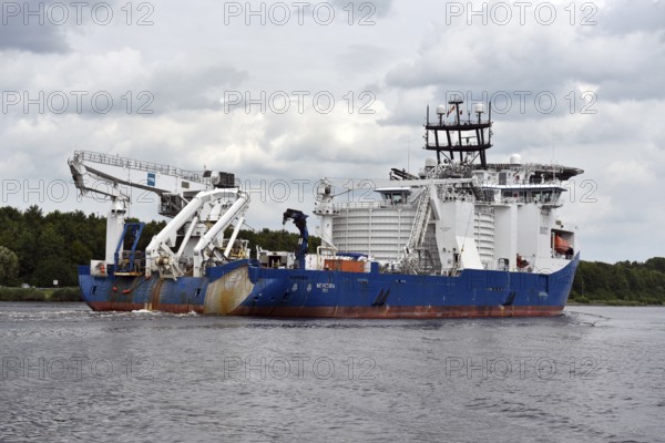 Cable carrier, sea cable carrier, ship, vessel, specialised ship, NKT VICTORIA sails in the Kiel