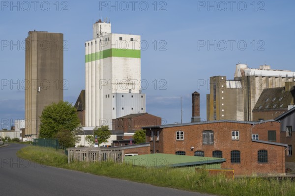 Grain silos, warehouses, land trade, outer harbour, Husum, North Frisia, North Sea,
