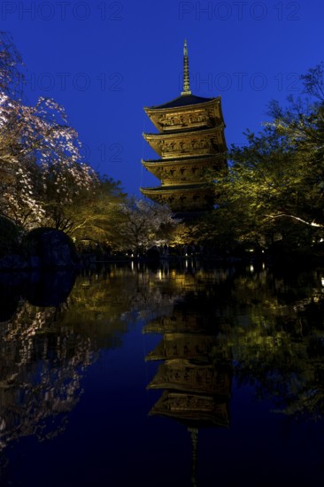 To-ji Temple reflected in the water of Toji Hyotan-ike Pond, blue hour, dusk, Minami-ku, Kyoto,