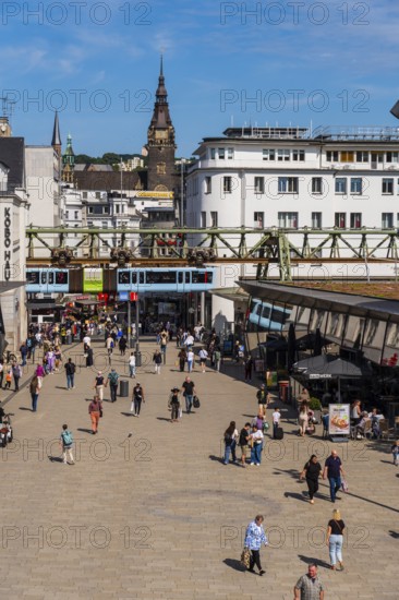 The Wuppertal suspension railway arrives at the Döppersberg stop in the city centre of Wuppertal,