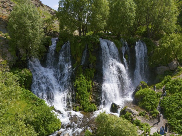 Several waterfalls surrounded by dense greenery and trees, aerial view, Shaki waterfall, Shaki,