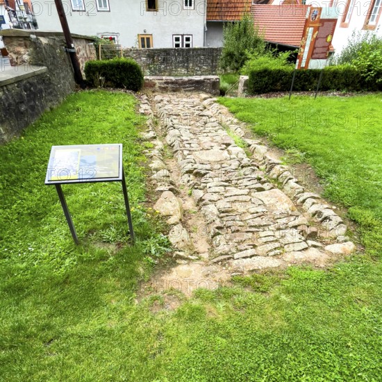 Archaeological find of original small section with old stones from historic trade route between