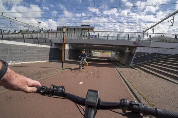 Cycle path in the east of Utrecht, subway of the railway line, at Utrecht-Lunetten station,