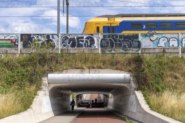Cycle path in the north of Nijmegen, subway of the railway line, wide cycle path, Netherlands